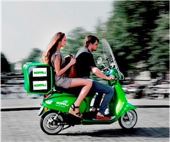 Hop maar achterop: elektrische scootertaxi van start in Amsterdam