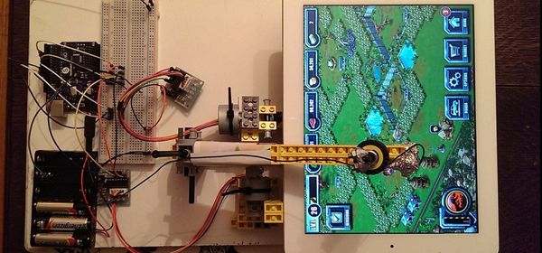 Lego-robot speelt freemium iPad-games terwijl maker slaapt