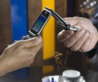 Telecombranche wil snel mobiel betalen via NFC